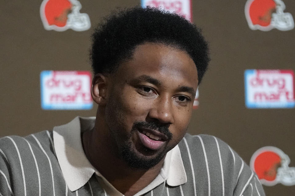 FILE - Cleveland Browns' Myles Garrett speaks during a news conference following an NFL football game against the Chicago Bears, Sunday, Dec. 17, 2023, in Cleveland. Garrett is a finalist for The Associated Press 2023 Defensive Player of the Year. (AP Photo/Sue Ogrocki, File)