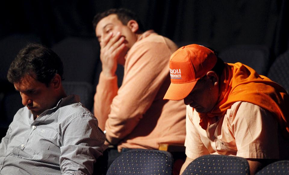 Supporters of presidential candidate Daniel Scioli, of Argentina's ruling party, react at the party's headquearters in Buenos Aires