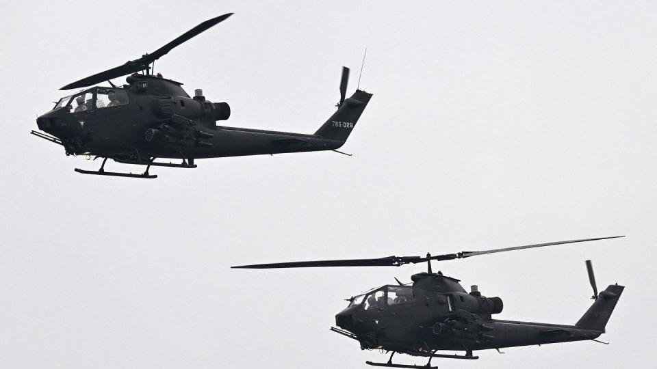 Pakistan Air Force helicopters fly past during a rehearsal ahead of a parade in Islamabad on March 21, 2024. (Aamir Qureshi/AFP via Getty Images)