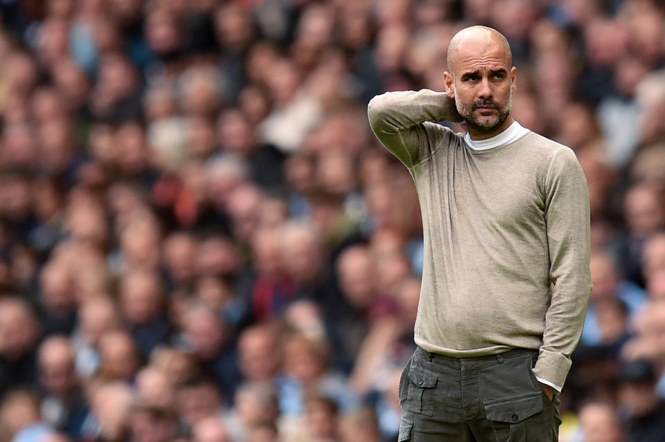 Manchester City's Spanish manager Pep Guardiola watches his players from the touchline during the English Premier League football match between Manchester City and Wolverhampton Wanderers at the Etihad Stadium in Manchester, north west England, on October 6, 2019. (Photo by Oli SCARFF / AFP) / RESTRICTED TO EDITORIAL USE. No use with unauthorized audio, video, data, fixture lists, club/league logos or 'live' services. Online in-match use limited to 120 images. An additional 40 images may be used in extra time. No video emulation. Social media in-match use limited to 120 images. An additional 40 images may be used in extra time. No use in betting publications, games or single club/league/player publications. /  (Photo by OLI SCARFF/AFP via Getty Images)