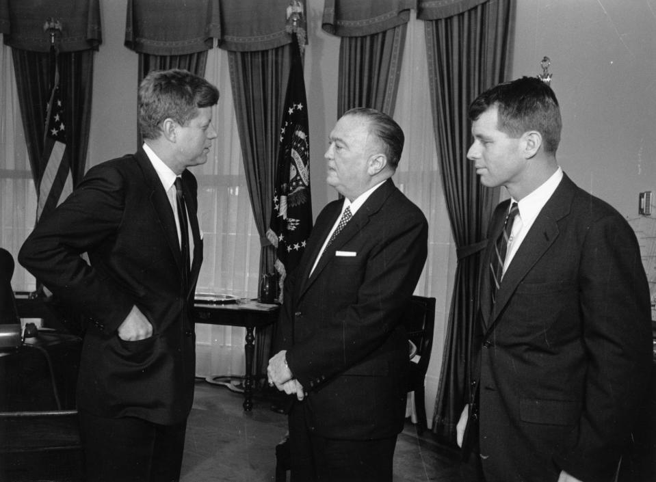 28th February 1961: American President John F Kennedy (1917 - 1963) at the White House with his brother Attorney General Robert Kennedy (1925 - 1968) and head of the FBI J Edgar Hoover (1895 - 1972). (Photo by Keystone/Getty Images)