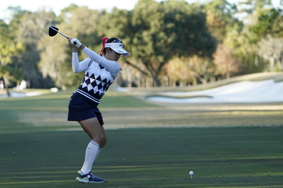 Yui Kawamoto of Japan, hits from the ninth tee, during the first round of the U.S. Women's Open Golf tournament, Thursday, Dec. 10, 2020, in Houston. (AP Photo/David J. Phillip)