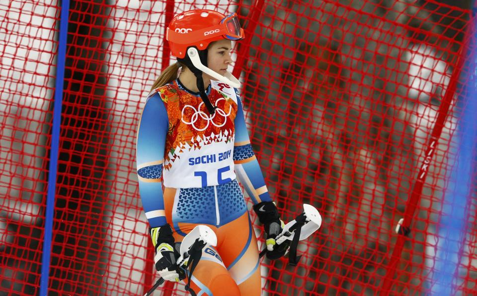 Norway's Loeseth reacts after skiing out during the first run of the women's alpine skiing slalom event at the 2014 Sochi Winter Olympics