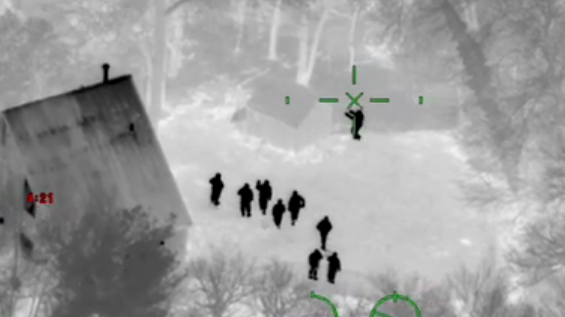 An infrared camera, from a state police helicopter, helped lead troopers to the suspect, in the tree of a backyard in Southborough.