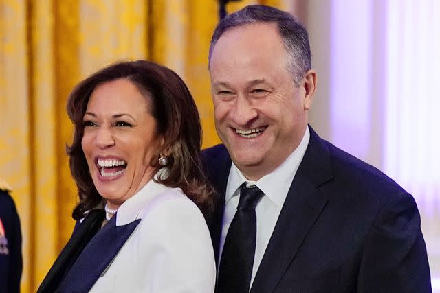 <p>Manuel Balce Ceneta/AP</p> Vice President Kamala Harris, pictured with second gentleman Doug Emhoff at the White House in April, says she feels blessed to be "Momala" to stepkids Cole and Ella Emhoff