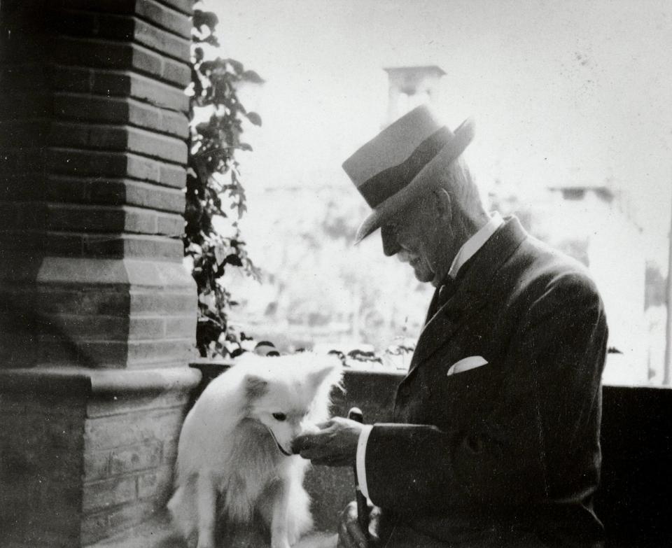 Henry Flagler with his German Spitz named Delos.