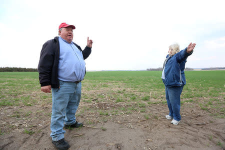 Art and Helen Tanderup show where the Keystone XL Pipeline will cut through the farm that has been in his wife, Helen's family for more than 100 years near Neligh, Nebraska, U.S. April 12, 2017. REUTERS/Lane Hickenbottom
