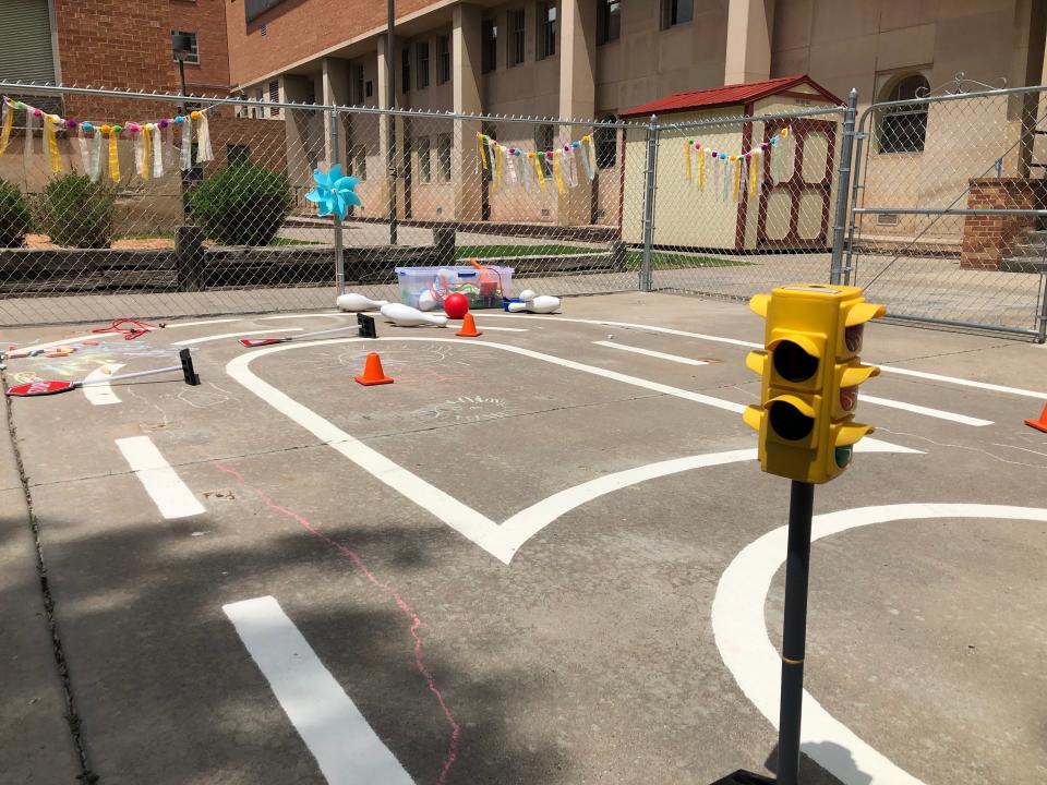 An outdoor play area in front of Life Center Academy at PCC