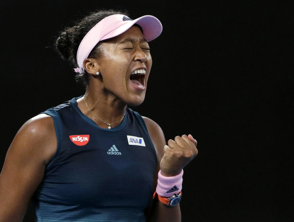 Japan's Naomi Osaka reacts after winning the first set against Petra Kvitova of the Czech Republic during the women's singles final at the Australian Open tennis championships in Melbourne, Australia, Saturday, Jan. 26, 2019. (AP Photo/Mark Schiefelbein)