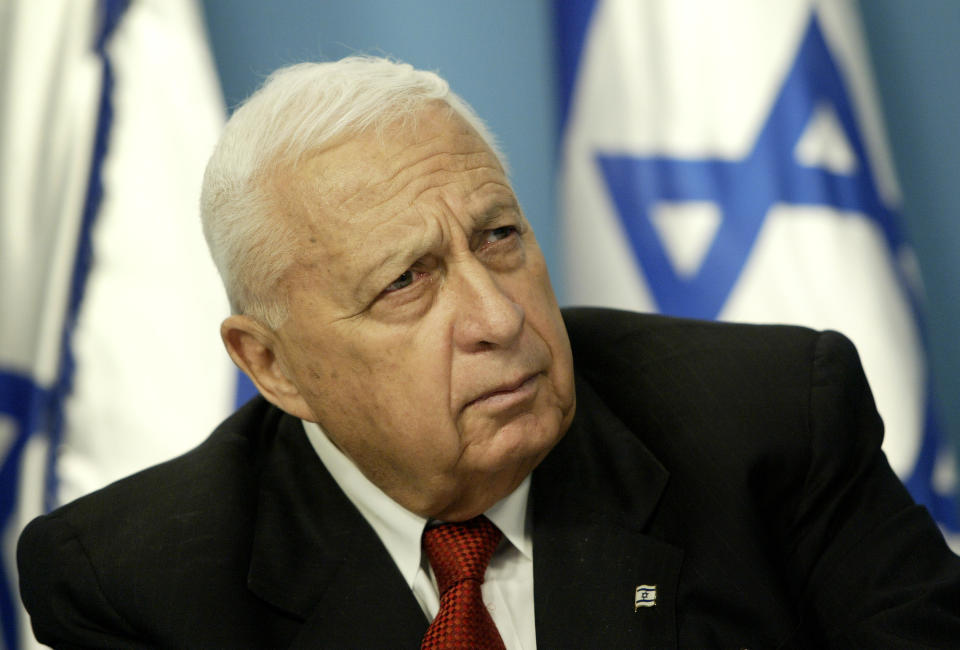 FILE -- In this Sunday May 16, 2004 file photo, Israeli Prime Minister Ariel Sharon pauses during a news conference in his Jerusalem office regarding education reform. On Wednesday, Jan. 1, 2014 the condition of the comatose former Israeli Prime Minister Ariel Sharon has taken a turn for the worse, the hospital treating him said Wednesday. Sharon, 85, has been in a coma since 2006 when a devastating stroke incapacitated him at the height of his political power. (AP Photo/Oded Balilty, File)