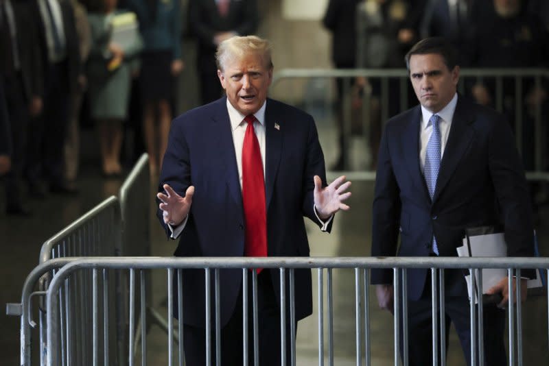 Former President Donald Trump speaks upon arriving for his criminal trial at Manhattan Criminal Court in New York on Tuesday. Pool Photo by Brendan McDermid/UPI