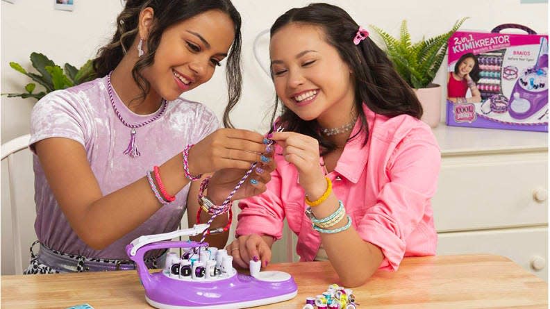 Credit:                      Cool Maker                                             Easily make friendship bracelets with the KumiKreator.