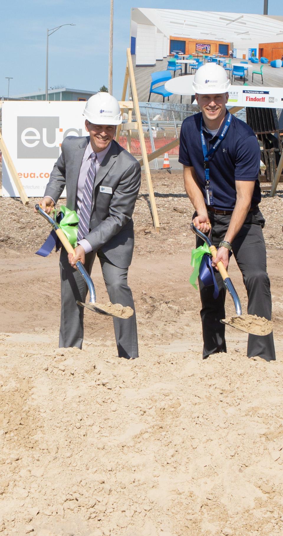 From left to right: Nicolet Union High School District Superintendent Dr. Greg Kabara, Nicolet Union High School Principal Joe Patek participate in a groundbreaking ceremony April 13 to officially kick off the construction on $77.4 million worth of facilities projects approved by voters in April 2022.