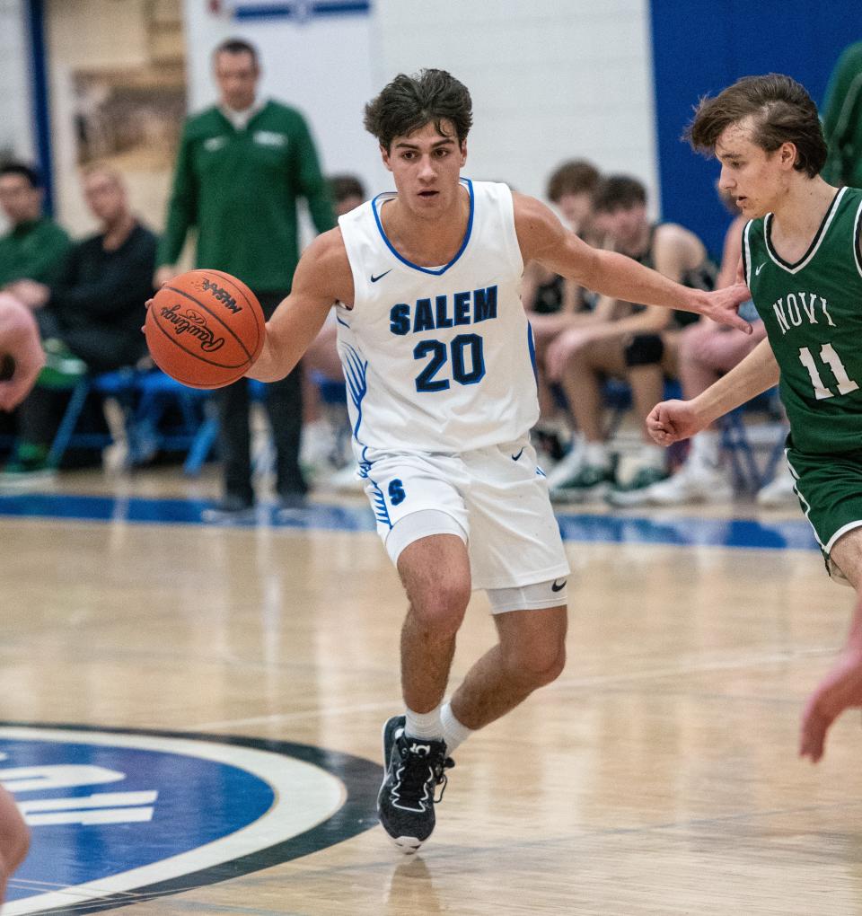 Salem's Ryan Peters dribbles up the floor during a Kensington Lakes Activities Association-West boys basketball game on Tuesday, Jan. 23, 2024.