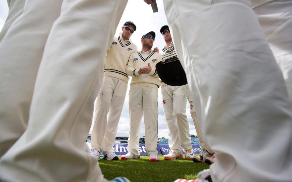  New Zealand cricket captain Brendon McCullum, centre, speaks to his team as they prepare to field on the fourth day of the second Test match between England and New Zealand at Headingley cricket ground in Leeds, England, - AP
