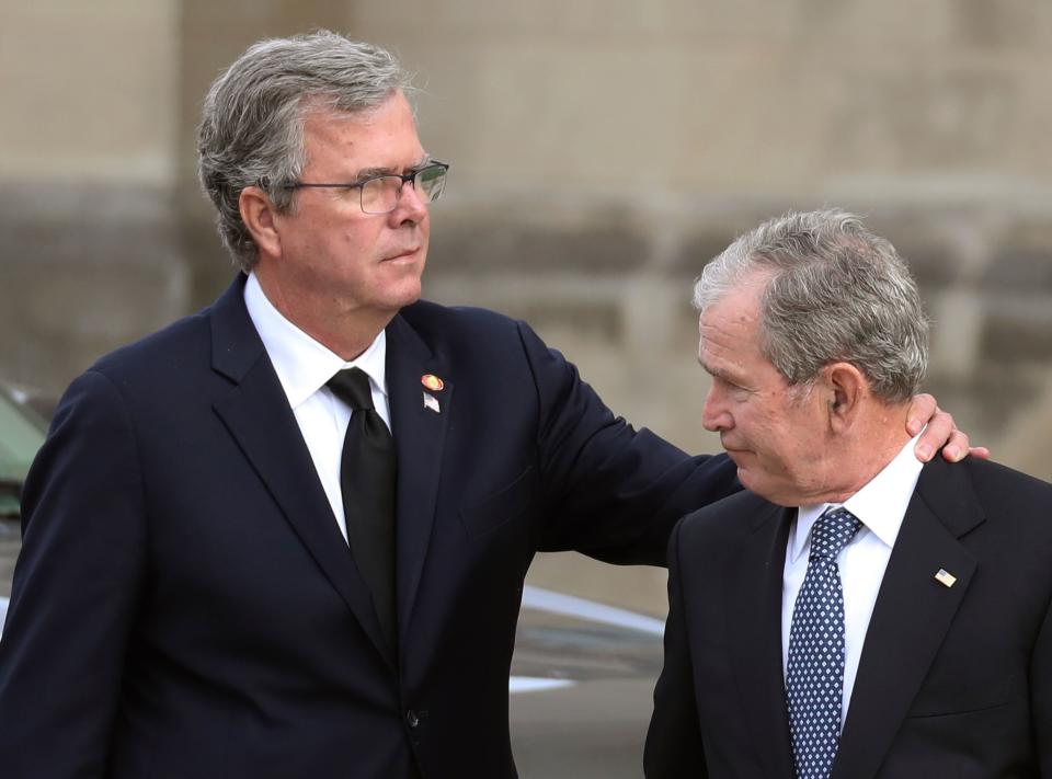 Former President George W. Bush (R) and his brother, former Florida Governor Jeb Bush, arrive for the funeral service for their father, former President George H. W. Bush, at the National Cathedral in Washington, Dec. 5, 2018. (Photo: Alex Edelman/AFP/Getty Images)