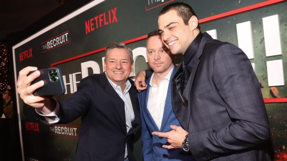 Even Netflix CEO Ted Sarandos (Left) likes selfies with his new “The Recruit” talent, show creator Alexi Hawley and star Noah Centineo (Right).