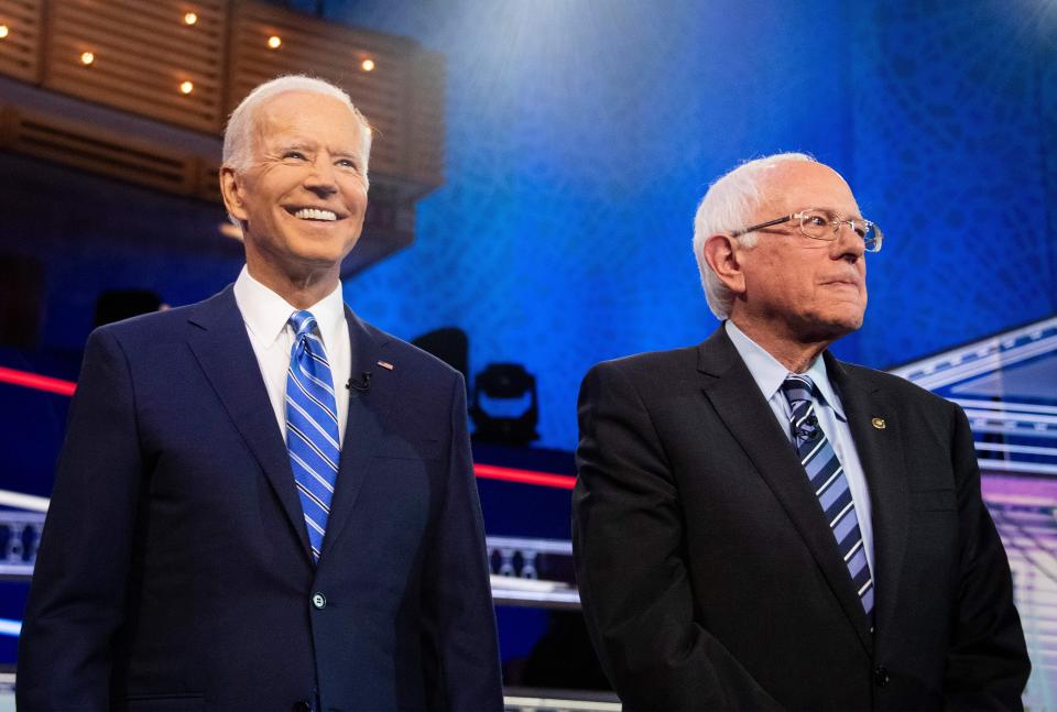 Sen. Bernie Sanders (I-Vt.), right, sees older, working-class voters backing former Vice President Joe Biden, left, as ripe for persuasion. (Photo: JIM WATSON/Getty Images)