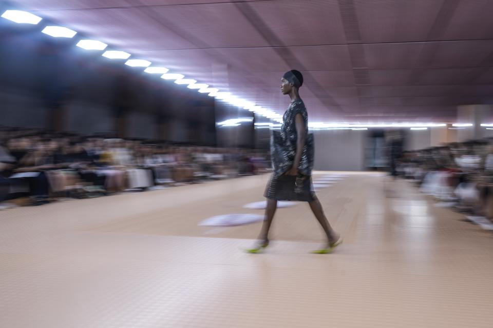 A model wears a creation as part of the Prada women's Spring Summer 2024 collection presented in Milan, Italy, Thursday, Sept. 21, 2023. (AP Photo/Antonio Calanni)