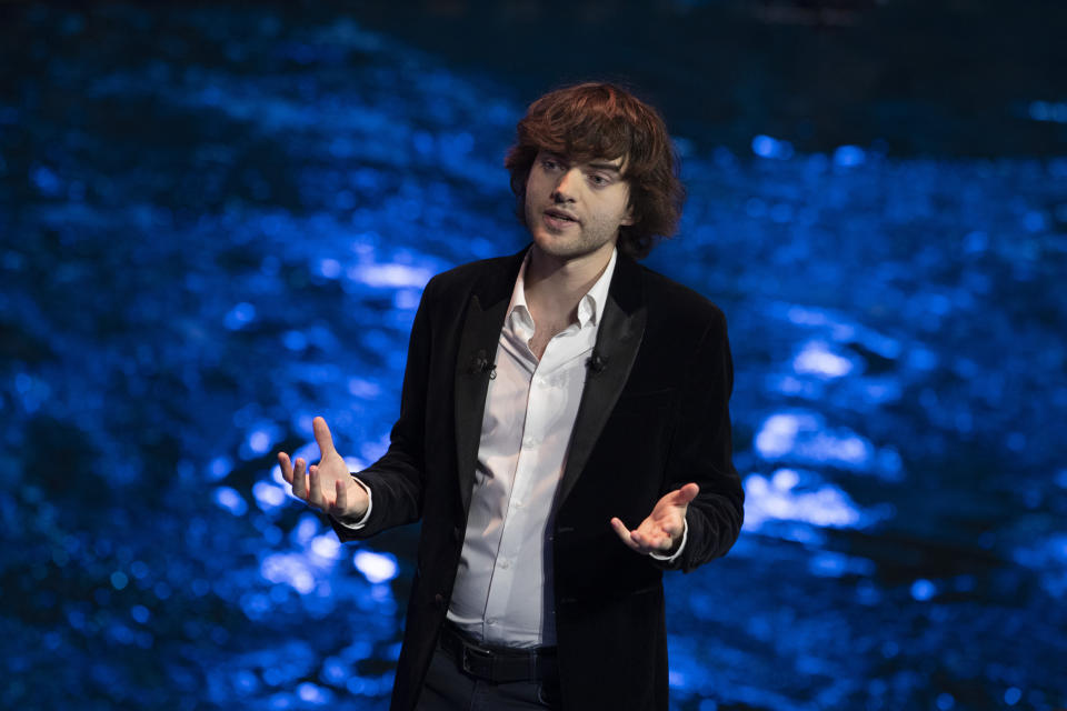 Young Dutch inventor Boyan Slat presents his plans for the Interceptor, a plastic-gathering floating device, during a presentation in Rotterdam, Netherlands, Saturday, Oct. 26, 2019. Slat is taking his effort to clean up floating plastic from the Pacific Ocean to rivers to catch garbage before it reaches the seas. (AP Photo/Peter Dejong)