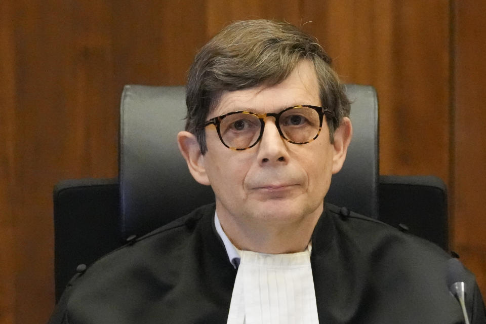 Presiding judge Boele prepares to read the verdict in an appeals court in The Hague, Netherlands, Tuesday Dec. 7, 2021, after a Hague District Court had ruled in January 2020 that the case against Benny Gantz and former Israeli air force commander Amir Eshel could not proceed because the men have "functional immunity from jurisdiction". The case was brought by Ismail Ziada, a Dutch-Palestinian who lost six members of his family in the airstrike that lawyers for the men argued was part of an Israeli military operation during the 2014 Gaza conflict. (AP Photo/Peter Dejong)