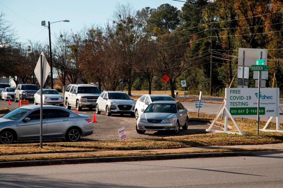 A long line of cars waits for coronavirus tests at the South Carolina Department of Health and Environmental Control in Columbia, South Carolina on Wednesday, December 23, 2020.