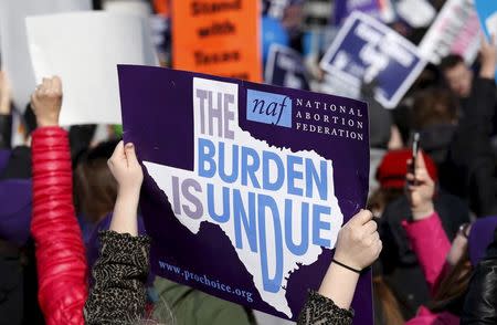 Protesters demonstrate in front of the U.S. Supreme Court as the court takes up a major abortion case in Washington, in this file photo taken March 2, 2016. REUTERS/Kevin Lamarque/Files