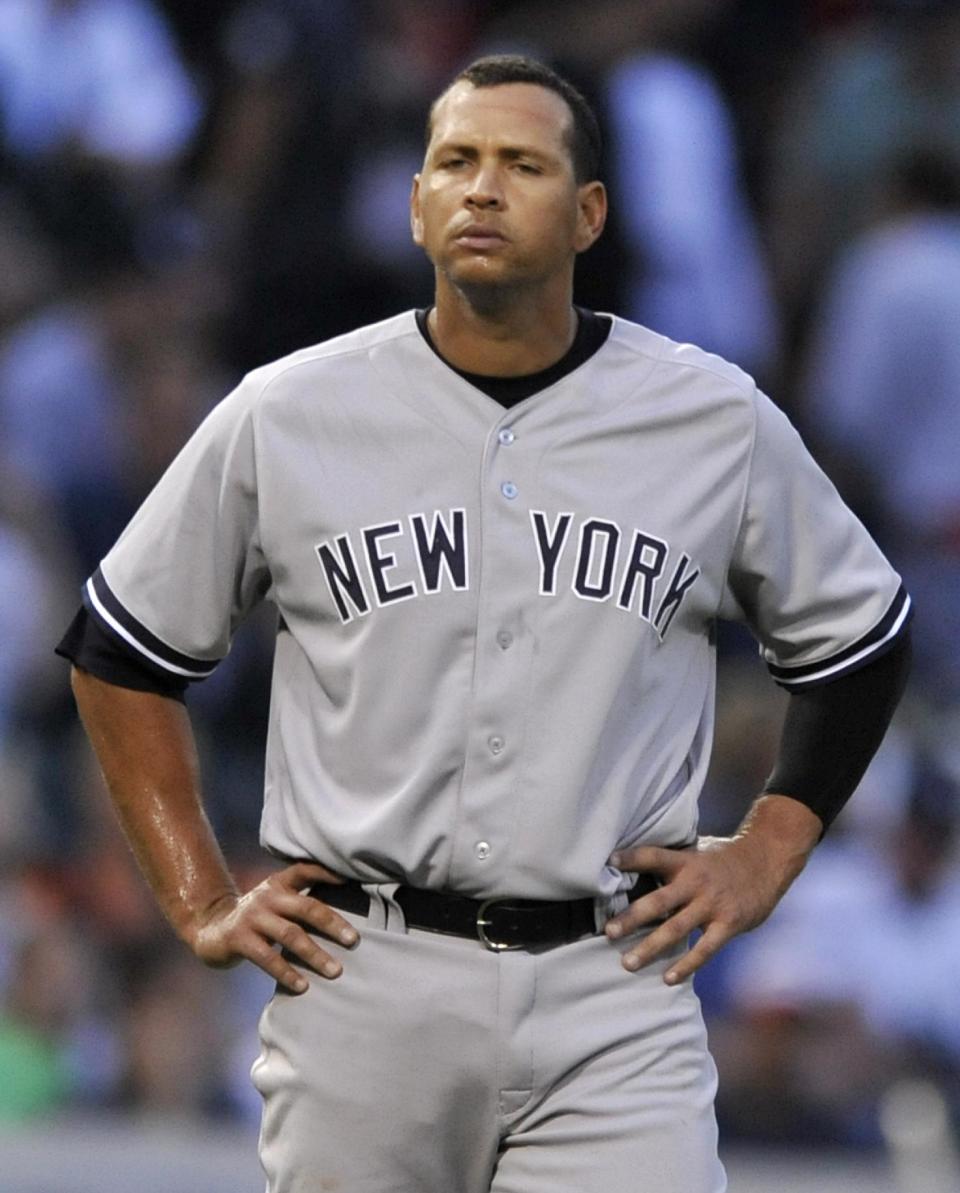 New York Yankees' Alex Rodriguez looks on during the third inning of a baseball game against the Chicago White Sox in Chicago, Monday, Aug. 5, 2013. (AP Photo/Paul Beaty)