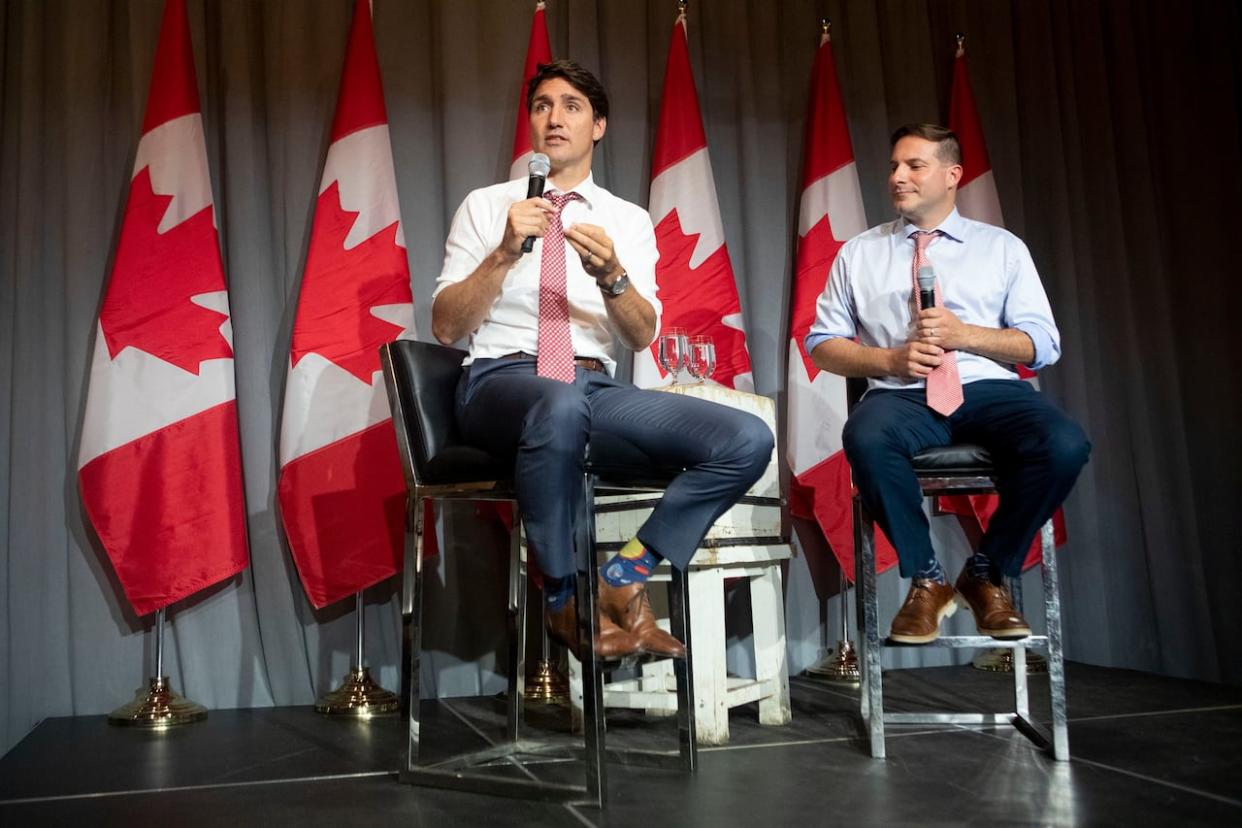 Prime Minister Justin Trudeau attends a Liberal Party fundraising event alongside Liberal MP Marco Mendicino in Toronto on September 4, 2019. (Chris Young/The Canadian Press - image credit)