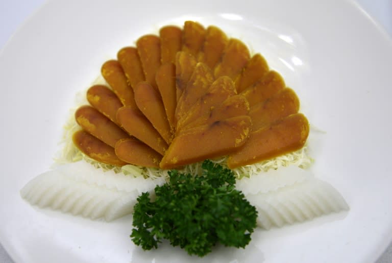 Shin Yeh is a 40-year-old institution in Taipei and staff hope Michelin will spotlight the types of traditional dishes it serves, such as dark orange slices of roasted mullet roe