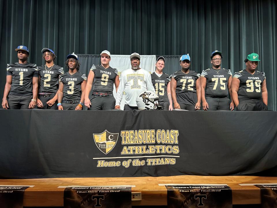 (From L to R) Treasure Coast football's Shamir Sterlin, Omari Kinsler, Jamison Davis, Richard Kramer, Irvin Jones, Ethan Degoede, Bootros Beaubrun, Knajee Saffold and Jahari Grant pose for photos during NSD on Wednesday, Feb. 7, 2024 from Treasure Coast High School.