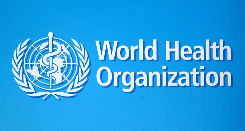 FILE PHOTO: The logo of the World Health Organization (WHO), is seen before a news conference in Geneva