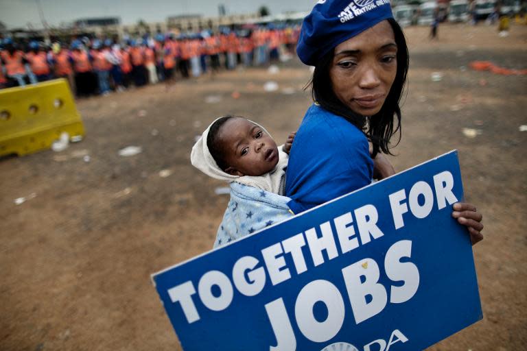 A supporter of the Democratic Alliance during a protest against corruption and unemployment on April 23, 2014 in Johannesberg