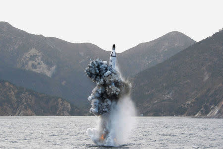 FILE PHOTO - An underwater test-firing of a strategic submarine ballistic missile is seen in this undated photo released by North Korea's Korean Central News Agency (KCNA) in Pyongyang on April 24, 2016. KCNA/File Photo via REUTERS
