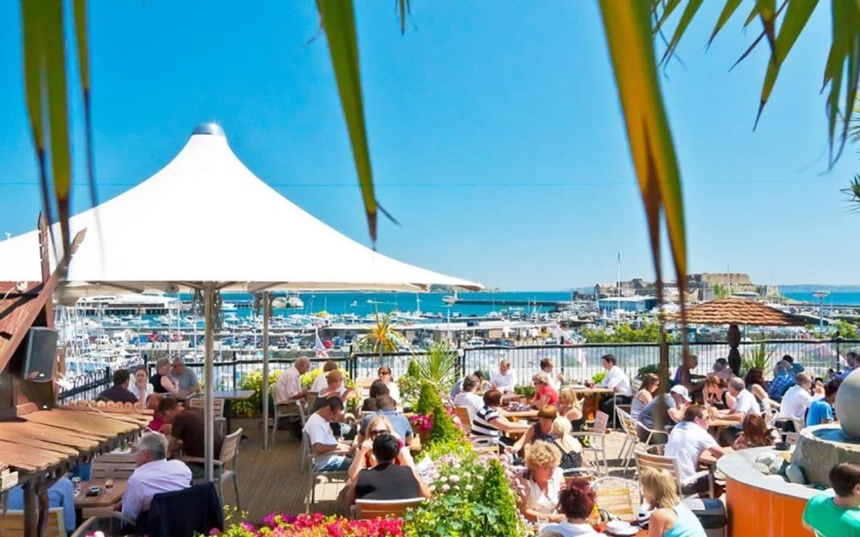 The Terrace has views of the marina and live music, Guernsey