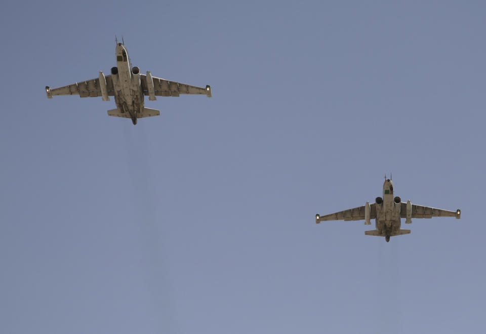 Russian Sukhoi Su-25 fighter planes arrive at Iraq's al-Muthanna military airbase at Baghdad airport, in Baghdad, July 1, 2014. (REUTERS/Stringer)