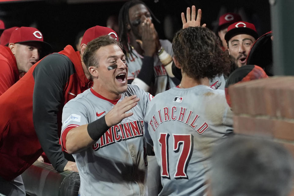 Cincinnati Reds' Stuart Fairchild (17) is congratulated by teammates after his inside-the-park home run against the San Francisco Giants during the eighth inning of a baseball game in San Francisco, Friday, May 10, 2024. (AP Photo/Jeff Chiu)