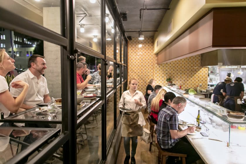 LOS ANGELES, CALIFORNIA - Oct. 21, 2019: Customers fill up the sectioned, varied space at Broken Spanish on Monday evening, Oct. 21, 2019, at the restaurant's location in downtown Los Angeles. (Photo / Silvia Razgova) Assignment ID: 469968