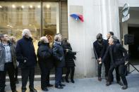 Paris' Mayor Anne Hidalgo, French actor Omar Sy, French director Roschdy Zem, and French actor James Thierrée, unveil a commemorative plaque for Rafael Padilla, also known as "Clown Chocolat", in Paris