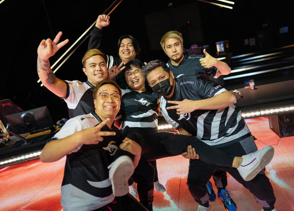 Team Secret pose after a win at the VALORANT Champions Groups Stage on December 7, 2021 in Potsdam, Germany. (Photo: Wojciech Wandzel/Riot Games Inc via Getty Images)