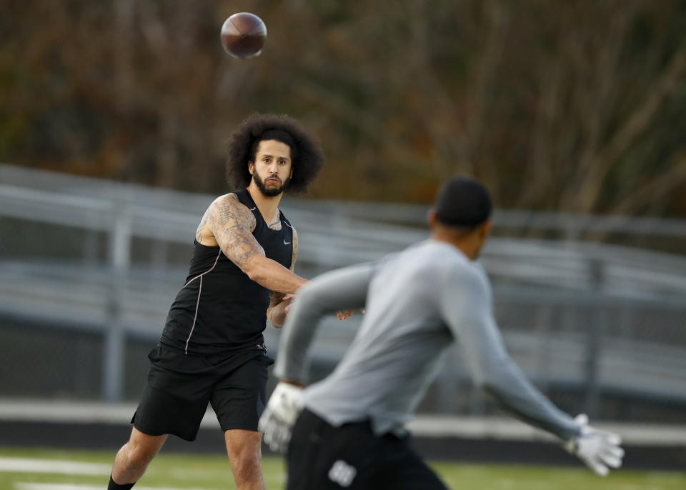 Free agent quarterback Colin Kaepernick participates in a workout for NFL football scouts and media, Saturday, Nov. 16, 2019, in Riverdale, Ga. (AP Photo/Todd Kirkland)