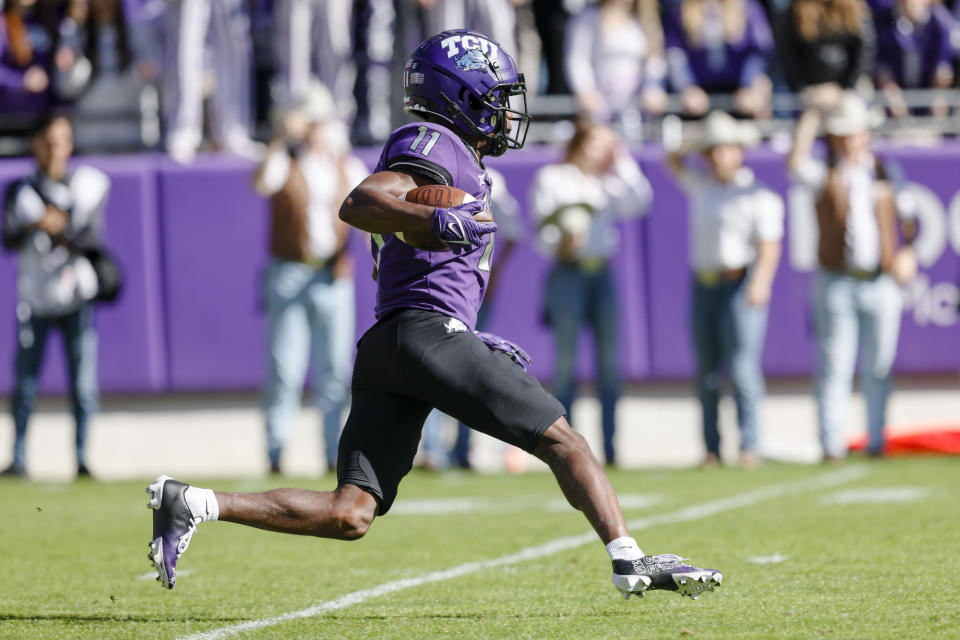 TCU Horned Frogs wide receiver Derius Davis (11) returns a punt during the game against the Texas Tech Red Raiders on November 5, 2022 at Amon G. Carter Stadium in Fort Worth, Texas. (Photo by Matthew Pearce/Icon Sportswire via Getty Images)