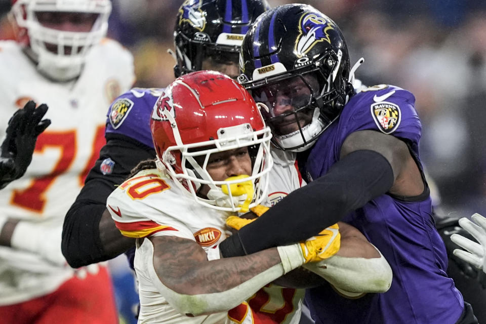 Baltimore Ravens linebacker Patrick Queen (6) hits Kansas City Chiefs running back Isiah Pacheco (10) during the second half of an AFC Championship NFL football game, Sunday, Jan. 28, 2024, in Baltimore. (AP Photo/Alex Brandon)