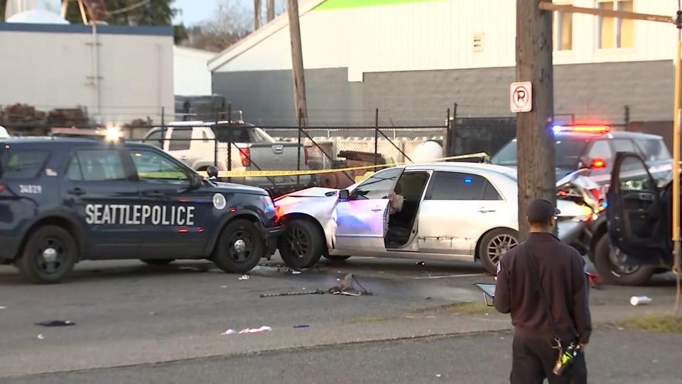 Seattle police said the crash happened during the recovery of a stolen car and a suspect is in custody.