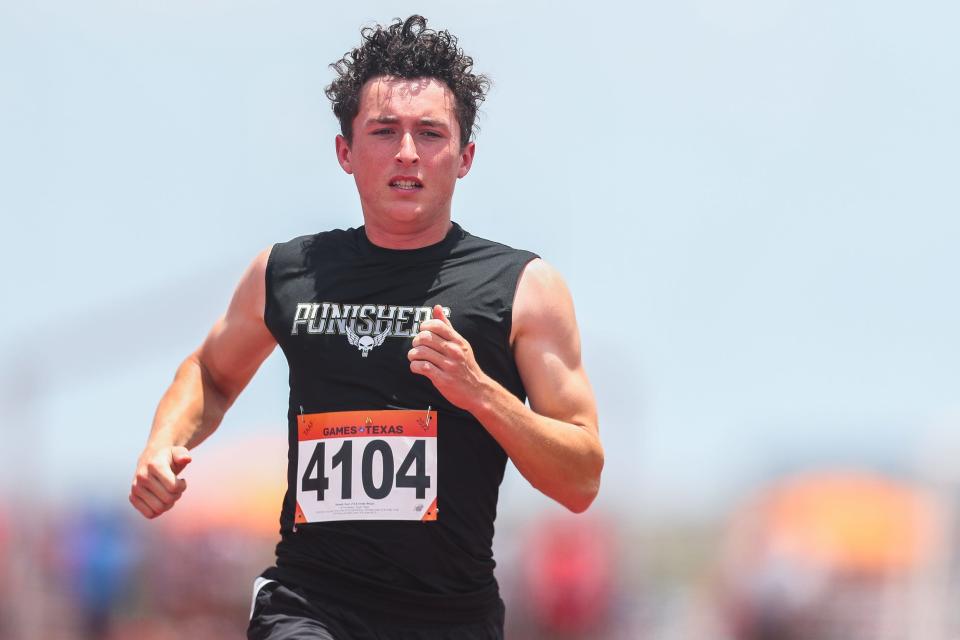 Flour Bluff's Zach Dewalt (4104) decelerates after crossing the finish line in a 100 yard preliminary sprint at the Games of Texas track and field competition at Cabaniss Athletic Complex in Corpus Christi, Texas on Saturday, July 23, 2022.