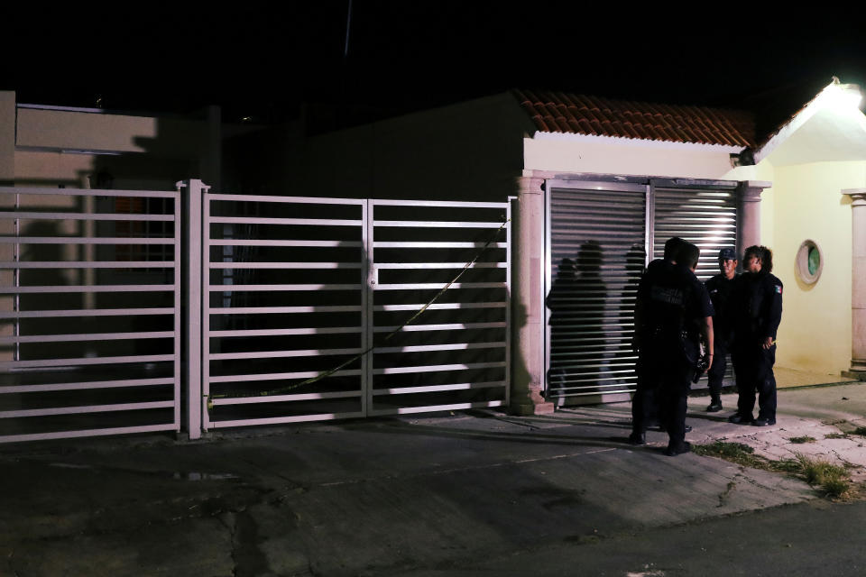 Police officers keep watch outside a call center were employees were kidnapped by unidentified individuals, in Cancun, Mexico July 3, 2019. REUTERS/Jorge Delgado