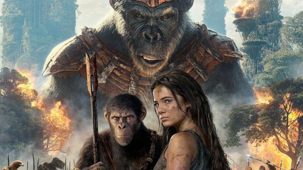  Two sentient apes and a human centered in a fiery post-apocalyptic background. 