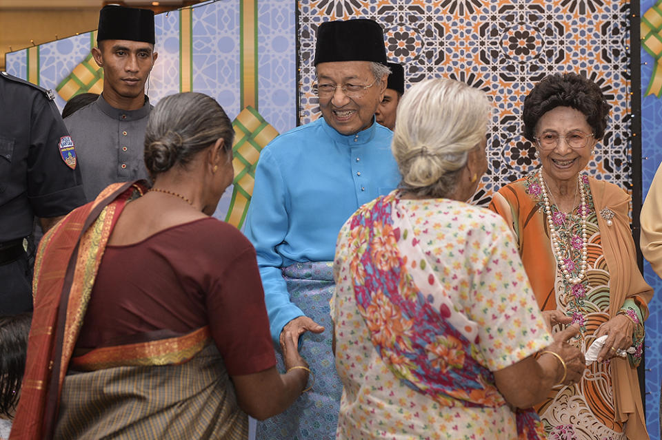 Prime Minister Tun Dr Mahathir Mohamad greets visitors to his Raya Open House at Seri Perdana, Putrajaya June 5, 2019. — Picture by Miera Zulyana