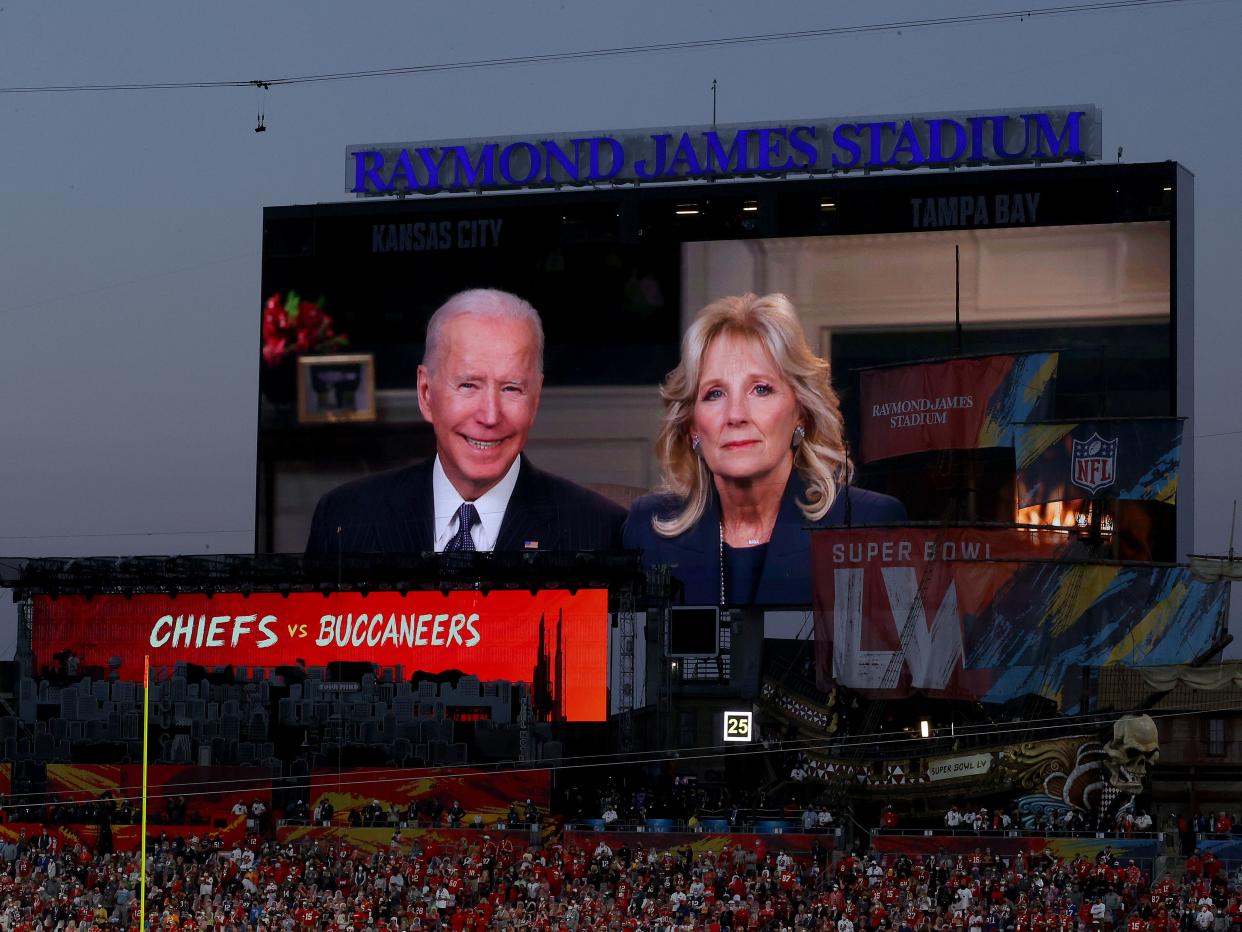 President Joe Biden and Dr Jill Biden deliver an address at Super Bowl LV (Kevin C Cox/Getty Images)