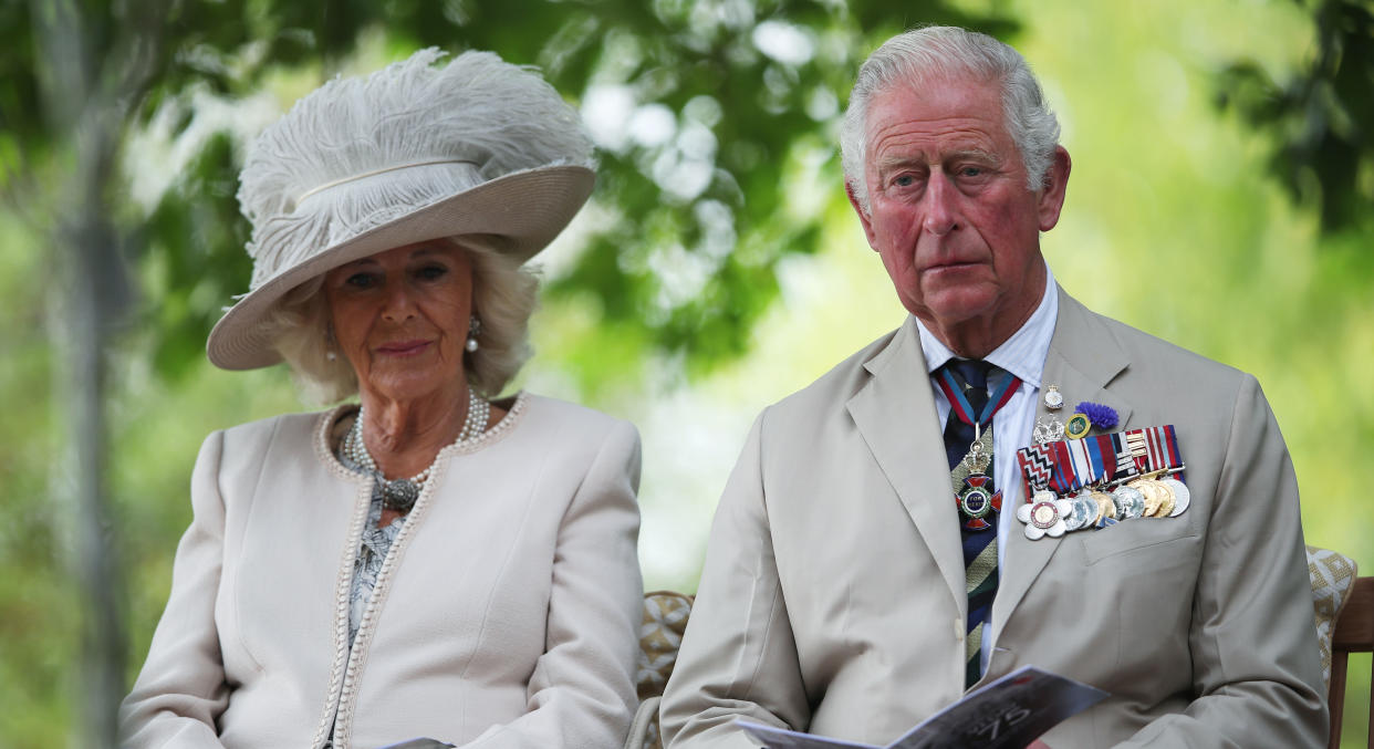 ALREWAS, ENGLAND - AUGUST 15:  Prince Charles, Prince of Wales and Camilla, Duchess of Cornwall attend the VJ Day National Remembrance event, held at the National Memorial Arboretum in Staffordshire, on August 15, 2020 in Alrewas, England. (Photo by Molly Darlington - WPA Pool/Getty Images)